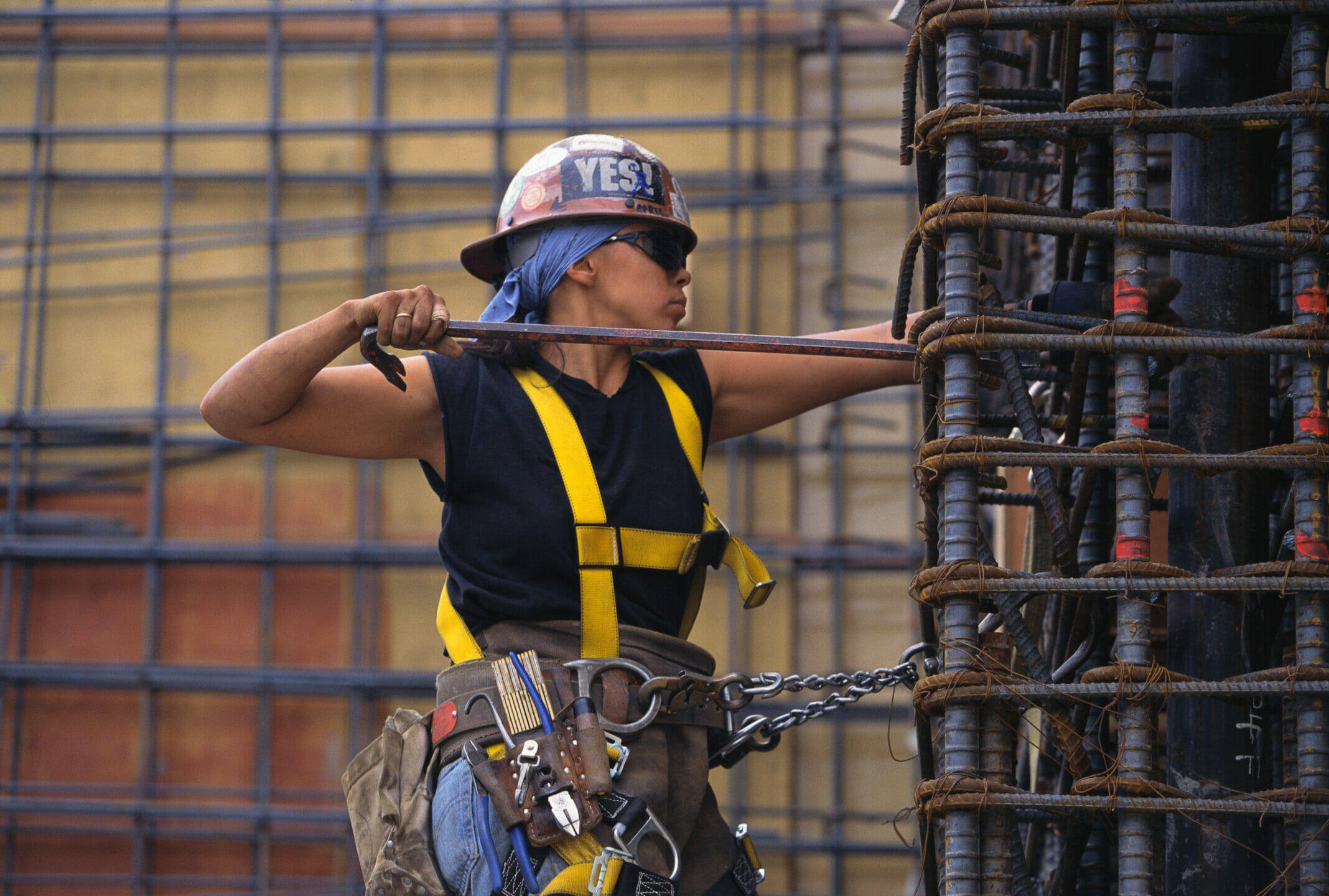 Woman working with rebar